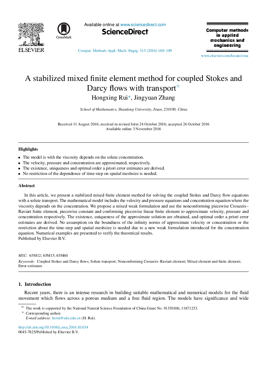 A stabilized mixed finite element method for coupled Stokes and Darcy flows with transport