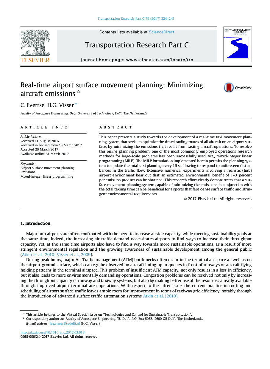 Real-time airport surface movement planning: Minimizing aircraft emissions