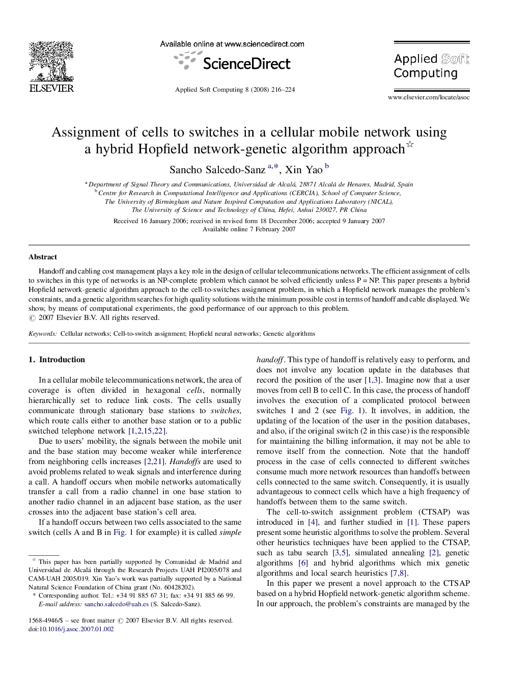 Assignment of cells to switches in a cellular mobile network using a hybrid Hopfield network-genetic algorithm approach