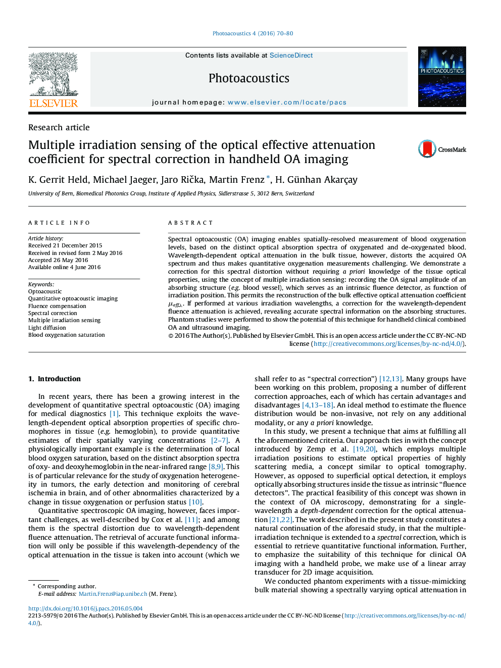Multiple irradiation sensing of the optical effective attenuation coefficient for spectral correction in handheld OA imaging