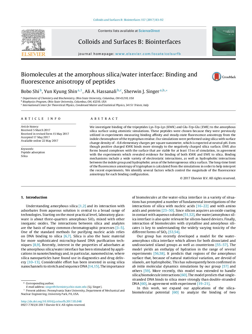 Biomolecules at the amorphous silica/water interface: Binding and fluorescence anisotropy of peptides