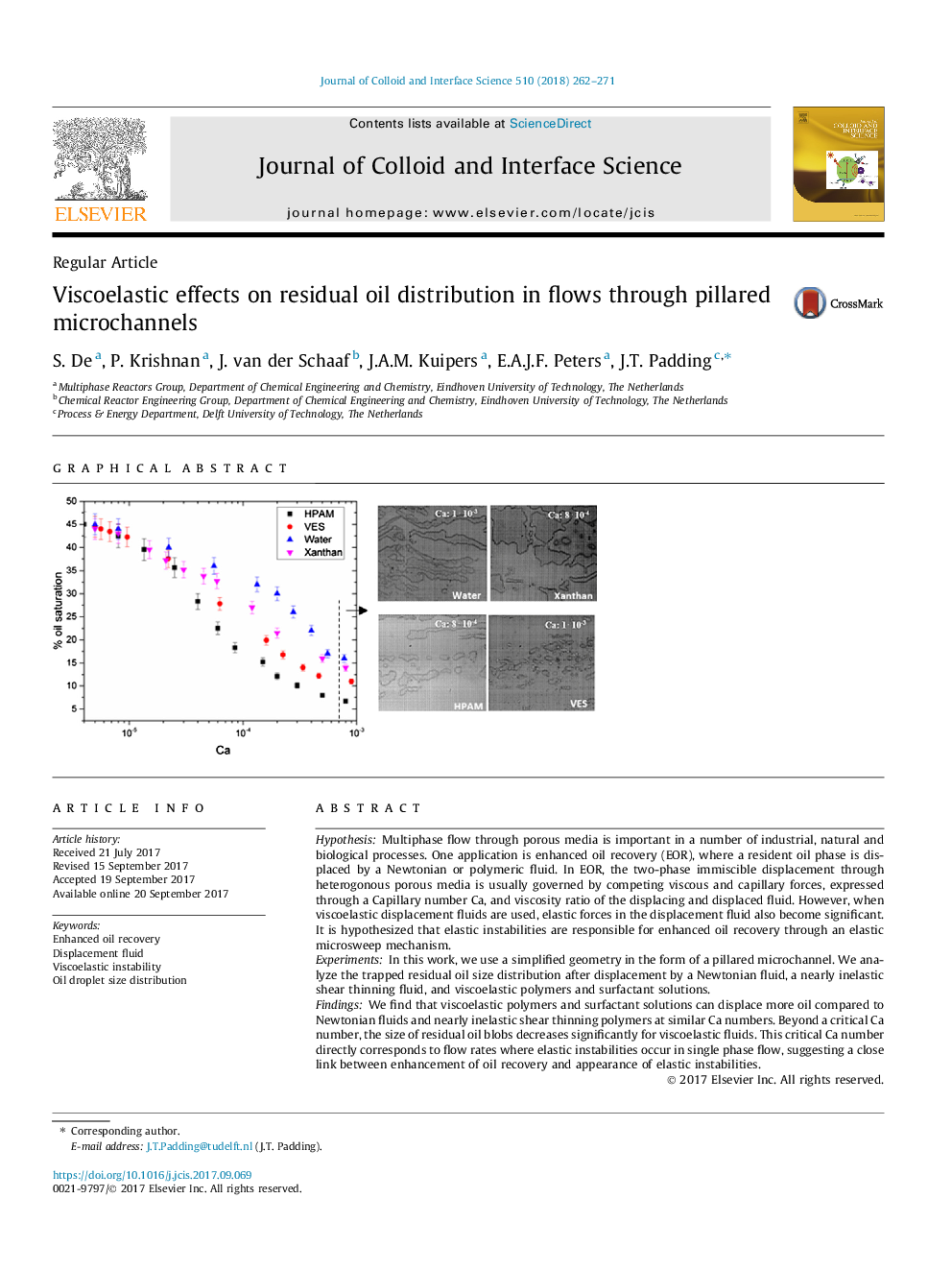 Viscoelastic effects on residual oil distribution in flows through pillared microchannels