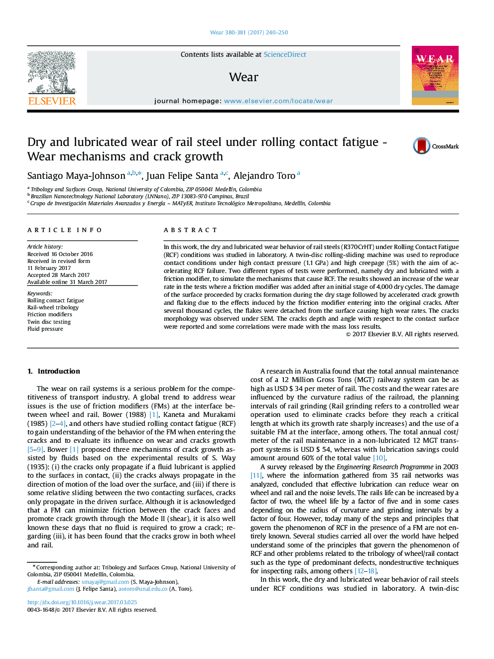 Dry and lubricated wear of rail steel under rolling contact fatigue - Wear mechanisms and crack growth