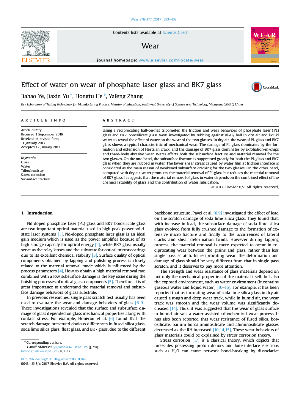 Effect of water on wear of phosphate laser glass and BK7 glass