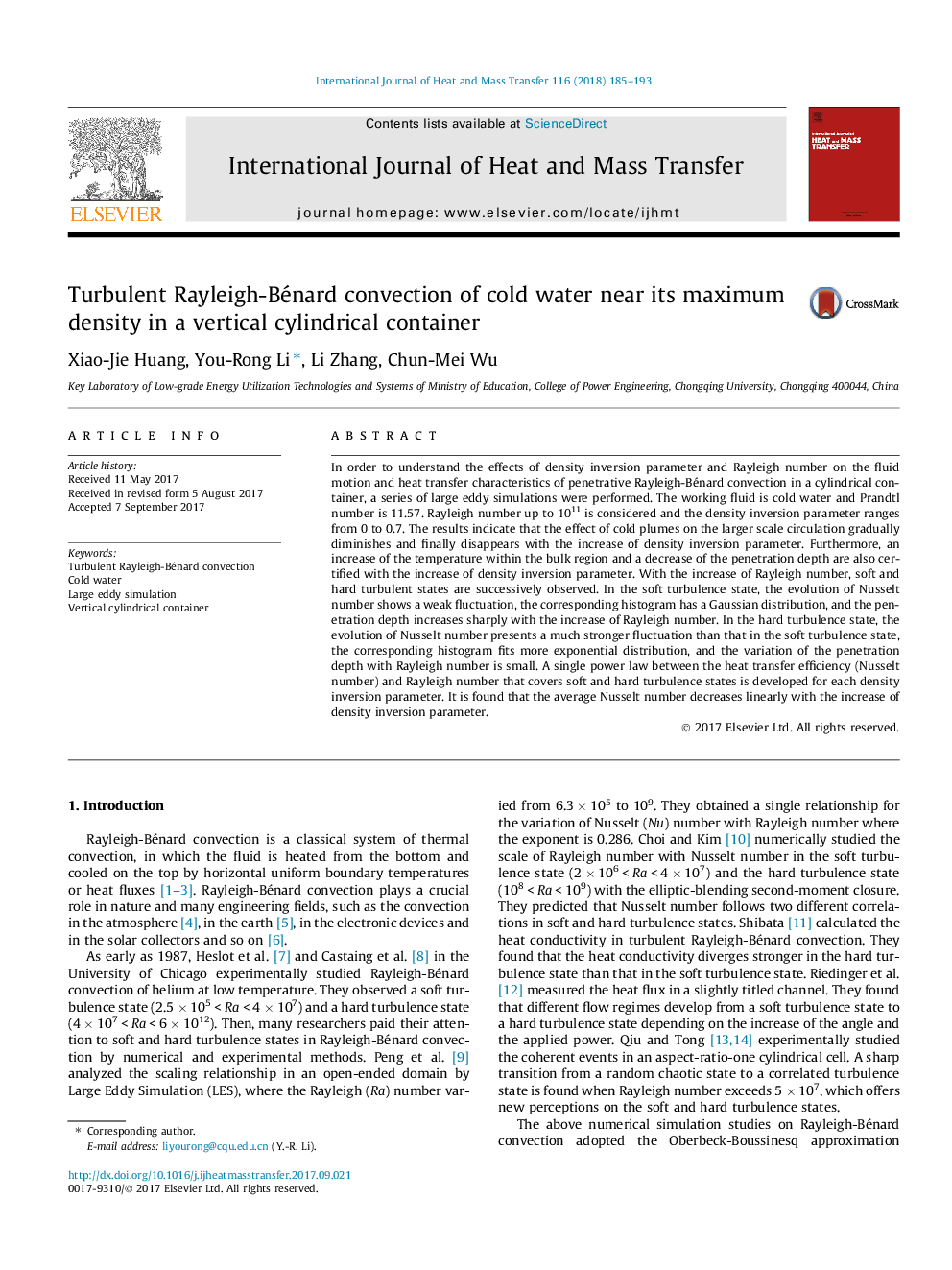 Turbulent Rayleigh-Bénard convection of cold water near its maximum density in a vertical cylindrical container