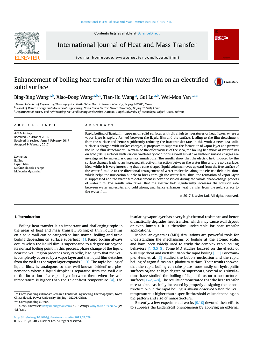 Enhancement of boiling heat transfer of thin water film on an electrified solid surface