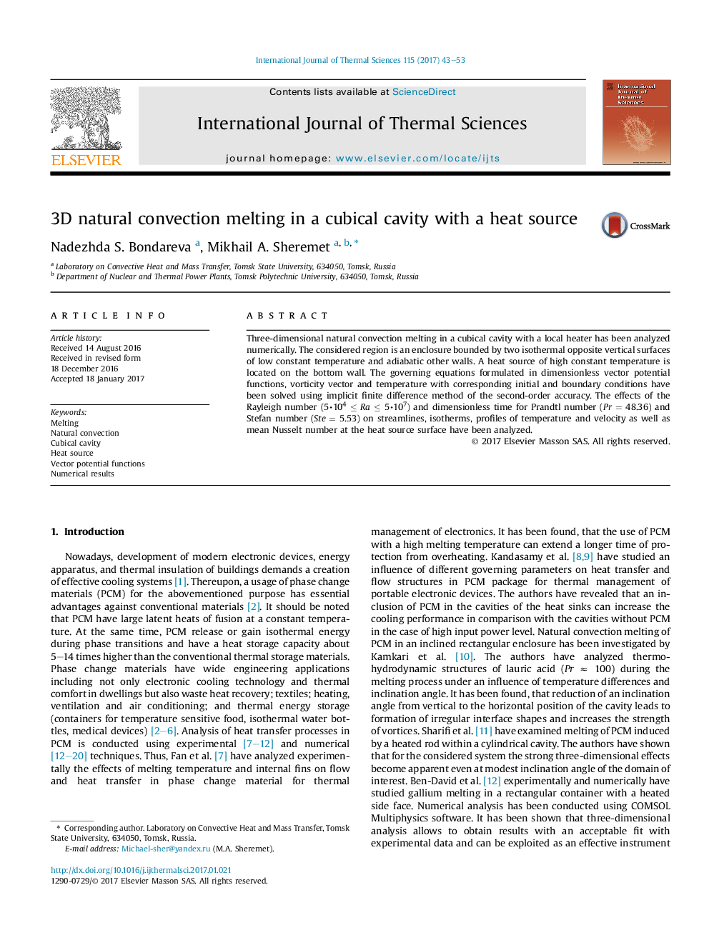 3D natural convection melting in a cubical cavity with a heat source