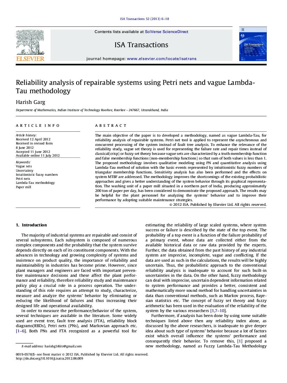 Reliability analysis of repairable systems using Petri nets and vague Lambda-Tau methodology