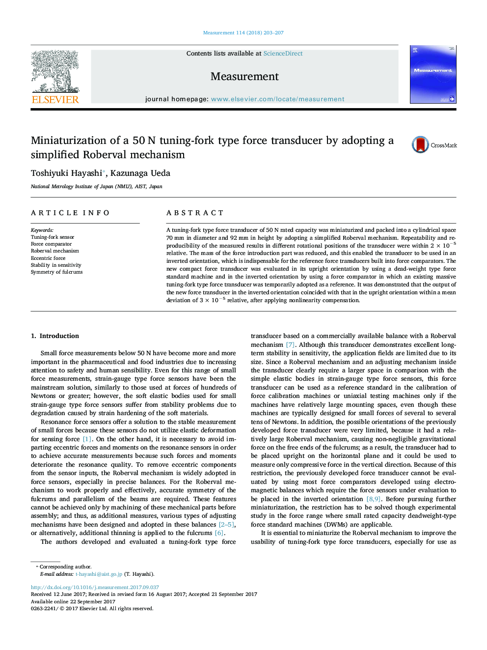 Miniaturization of a 50Â N tuning-fork type force transducer by adopting a simplified Roberval mechanism