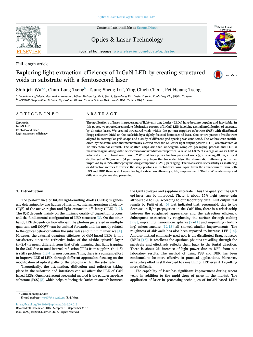 Exploring light extraction efficiency of InGaN LED by creating structured voids in substrate with a femtosecond laser