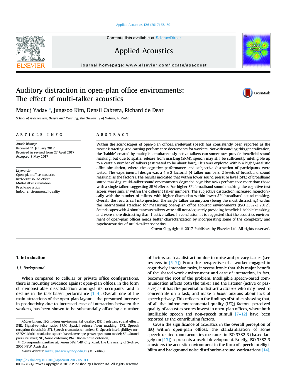 Auditory distraction in open-plan office environments: The effect of multi-talker acoustics