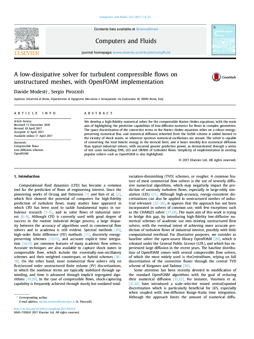 A low-dissipative solver for turbulent compressible flows on unstructured meshes, with OpenFOAM implementation