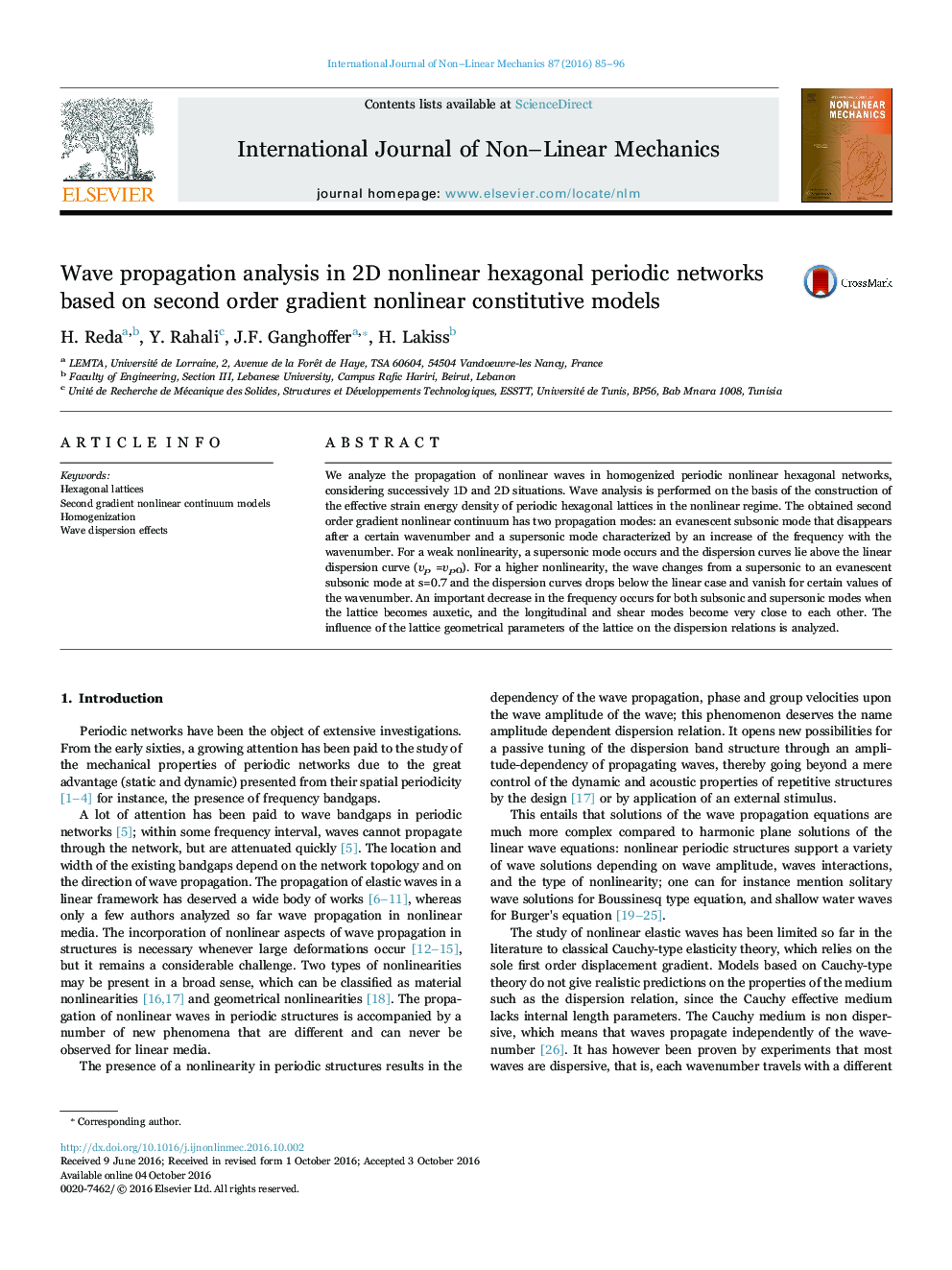 Wave propagation analysis in 2D nonlinear hexagonal periodic networks based on second order gradient nonlinear constitutive models