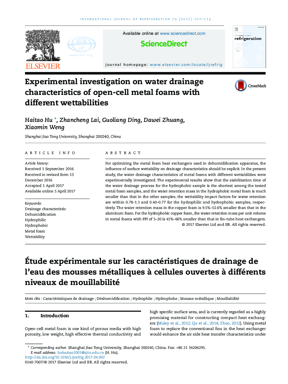 Experimental investigation on water drainage characteristics of open-cell metal foams with different wettabilities