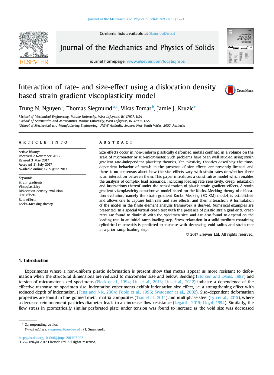 Interaction of rate- and size-effect using a dislocation density based strain gradient viscoplasticity model