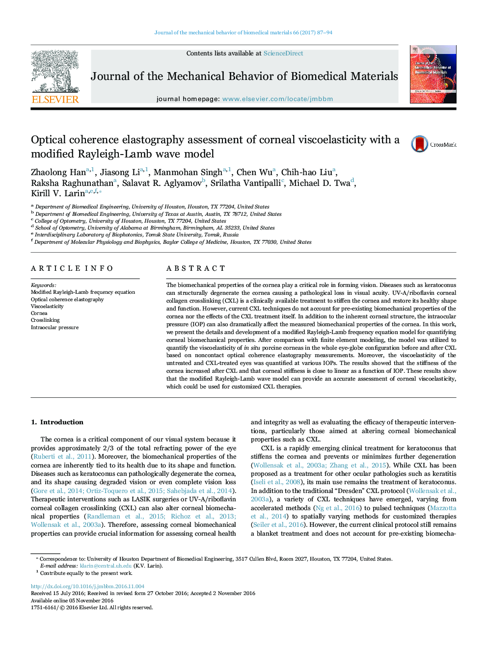 Optical coherence elastography assessment of corneal viscoelasticity with a modified Rayleigh-Lamb wave model