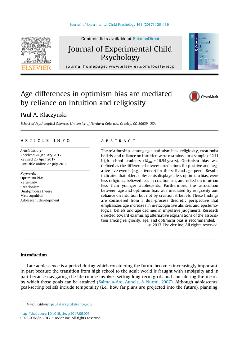 Age differences in optimism bias are mediated by reliance on intuition and religiosity