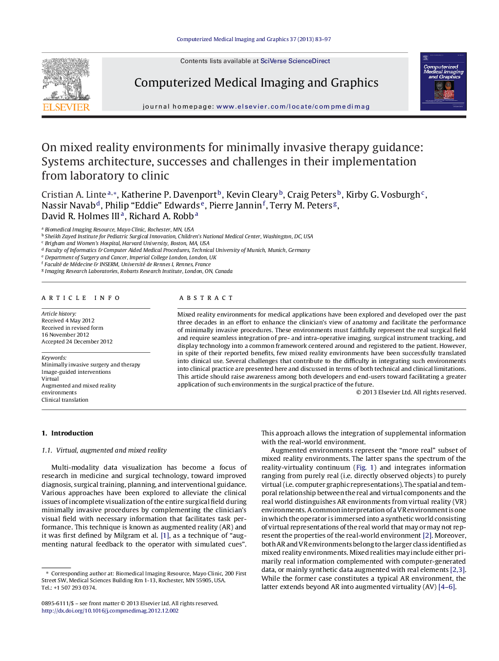 On mixed reality environments for minimally invasive therapy guidance: Systems architecture, successes and challenges in their implementation from laboratory to clinic