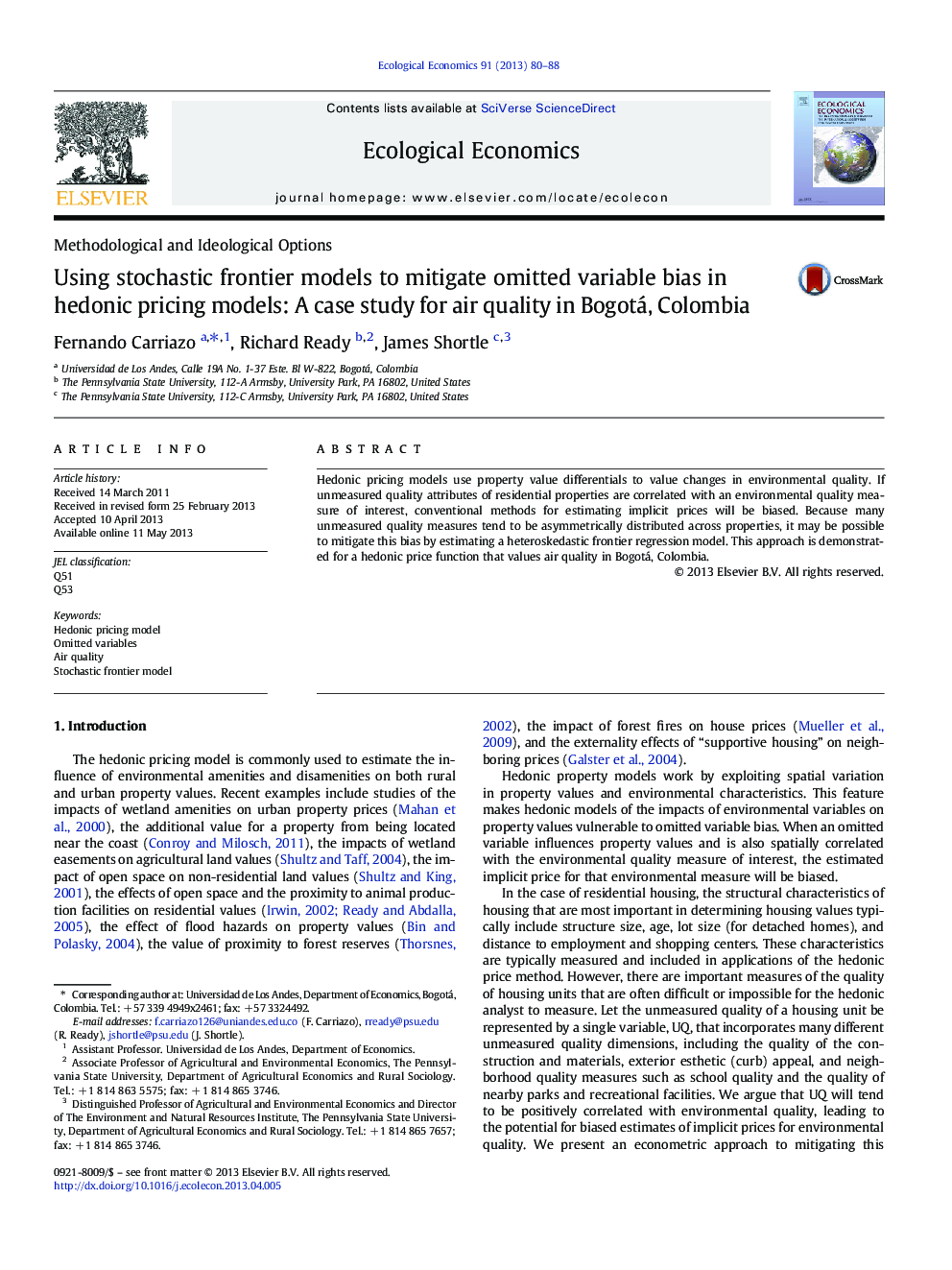 Using stochastic frontier models to mitigate omitted variable bias in hedonic pricing models: A case study for air quality in Bogotá, Colombia