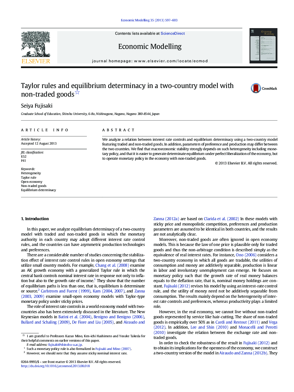 Taylor rules and equilibrium determinacy in a two-country model with non-traded goods