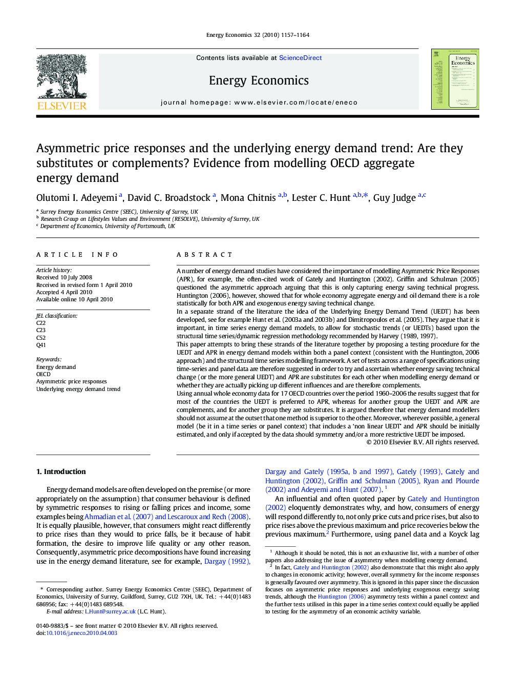 Asymmetric price responses and the underlying energy demand trend: Are they substitutes or complements? Evidence from modelling OECD aggregate energy demand