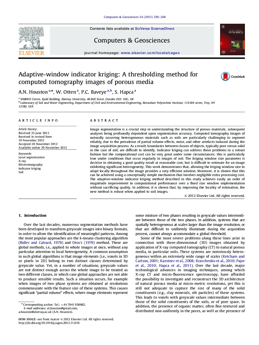 Adaptive-window indicator kriging: A thresholding method for computed tomography images of porous media