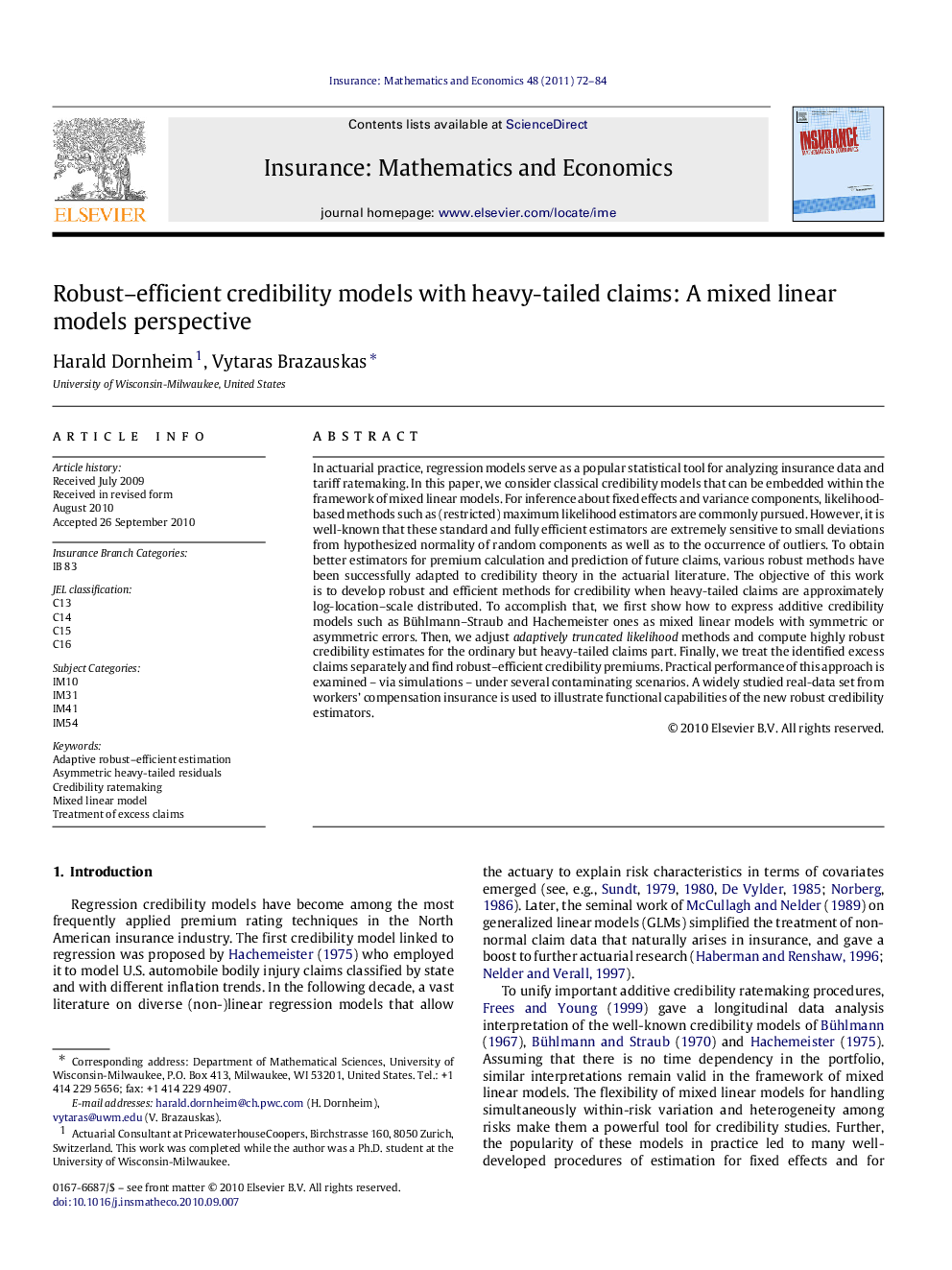 Robust-efficient credibility models with heavy-tailed claims: A mixed linear models perspective