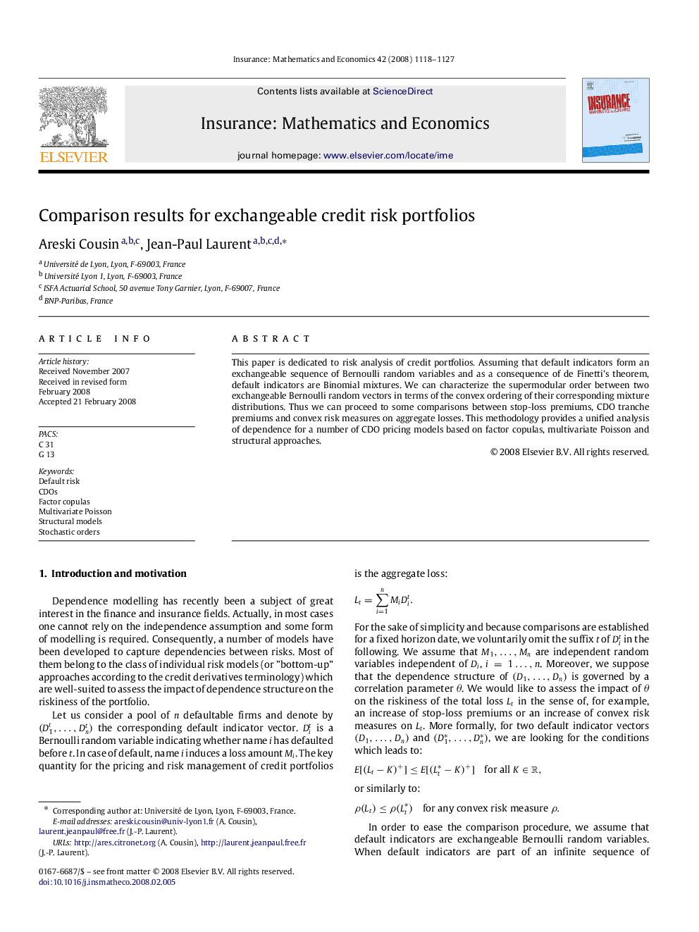 Comparison results for exchangeable credit risk portfolios