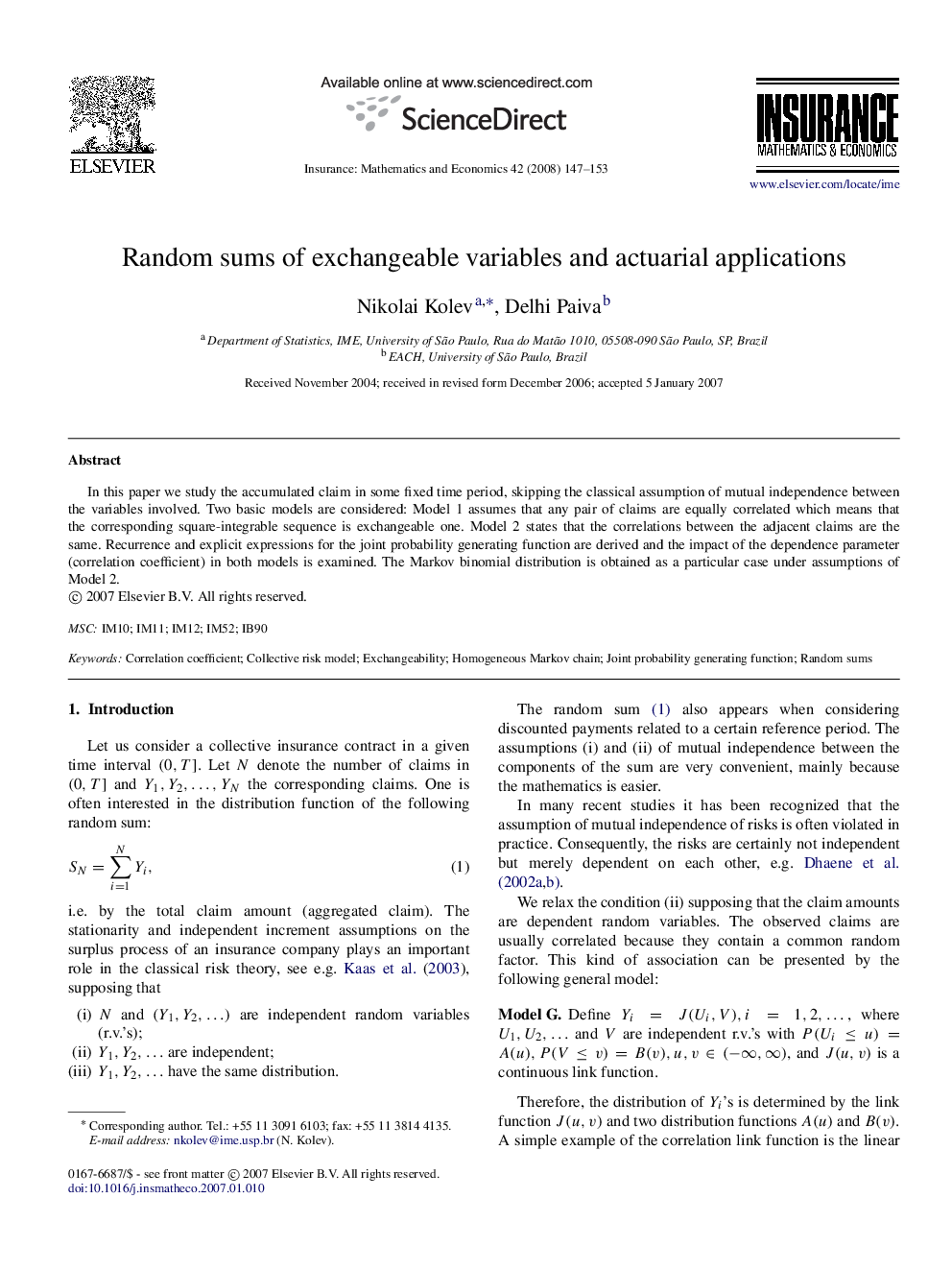 Random sums of exchangeable variables and actuarial applications