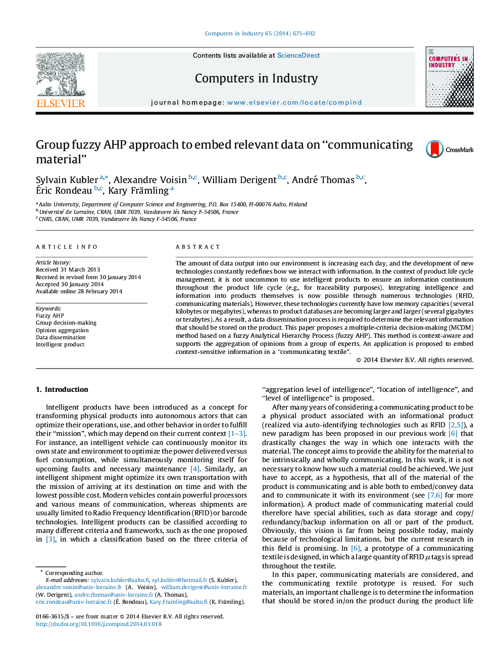 Group fuzzy AHP approach to embed relevant data on “communicating material”