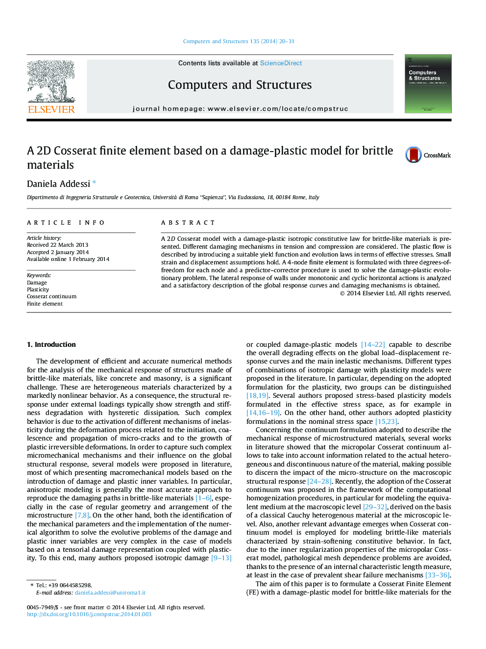 A 2D Cosserat finite element based on a damage-plastic model for brittle materials