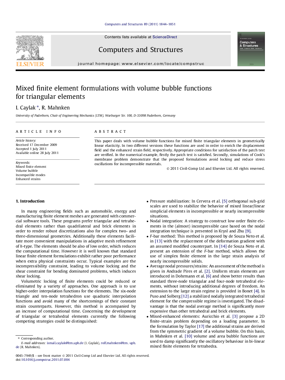 Mixed finite element formulations with volume bubble functions for triangular elements