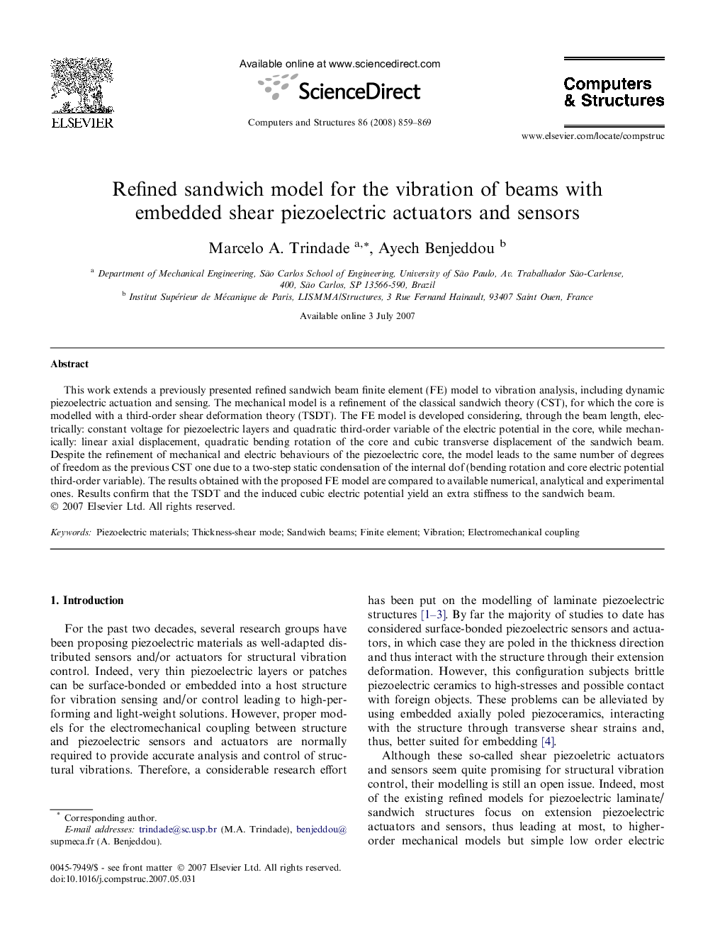 Refined sandwich model for the vibration of beams with embedded shear piezoelectric actuators and sensors