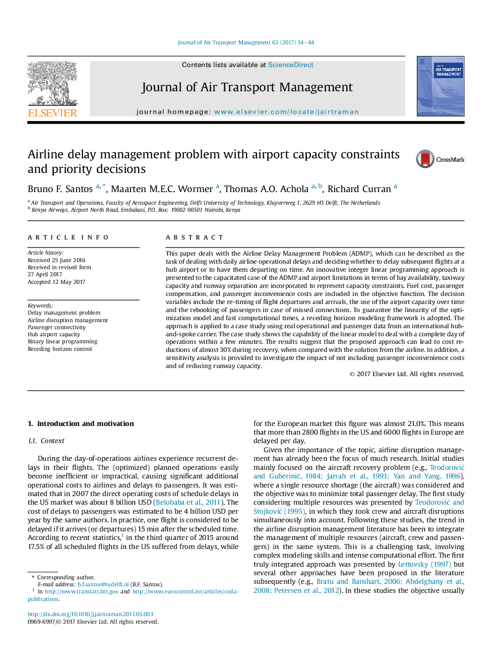 Airline delay management problem with airport capacity constraints and priority decisions