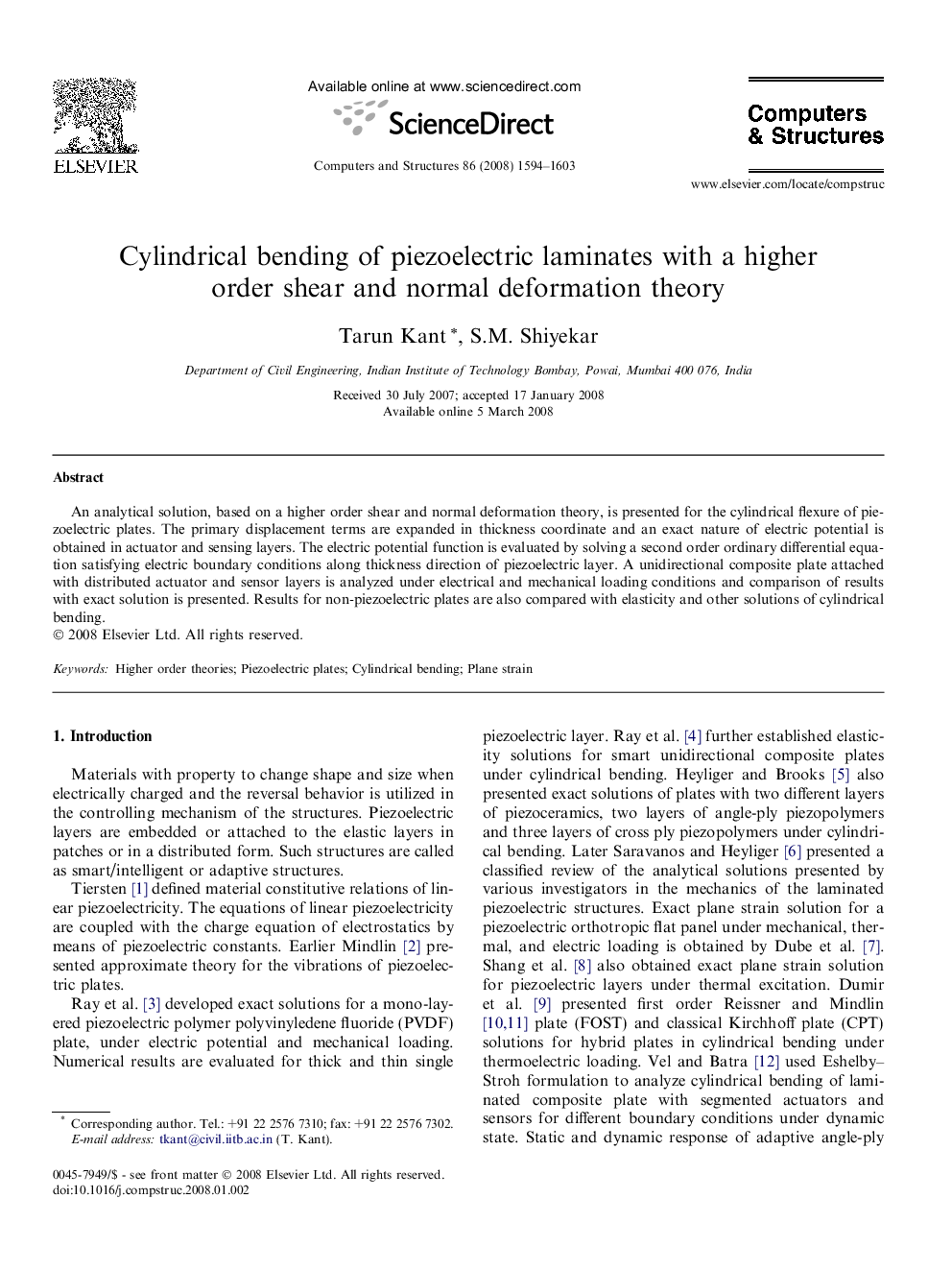 Cylindrical bending of piezoelectric laminates with a higher order shear and normal deformation theory