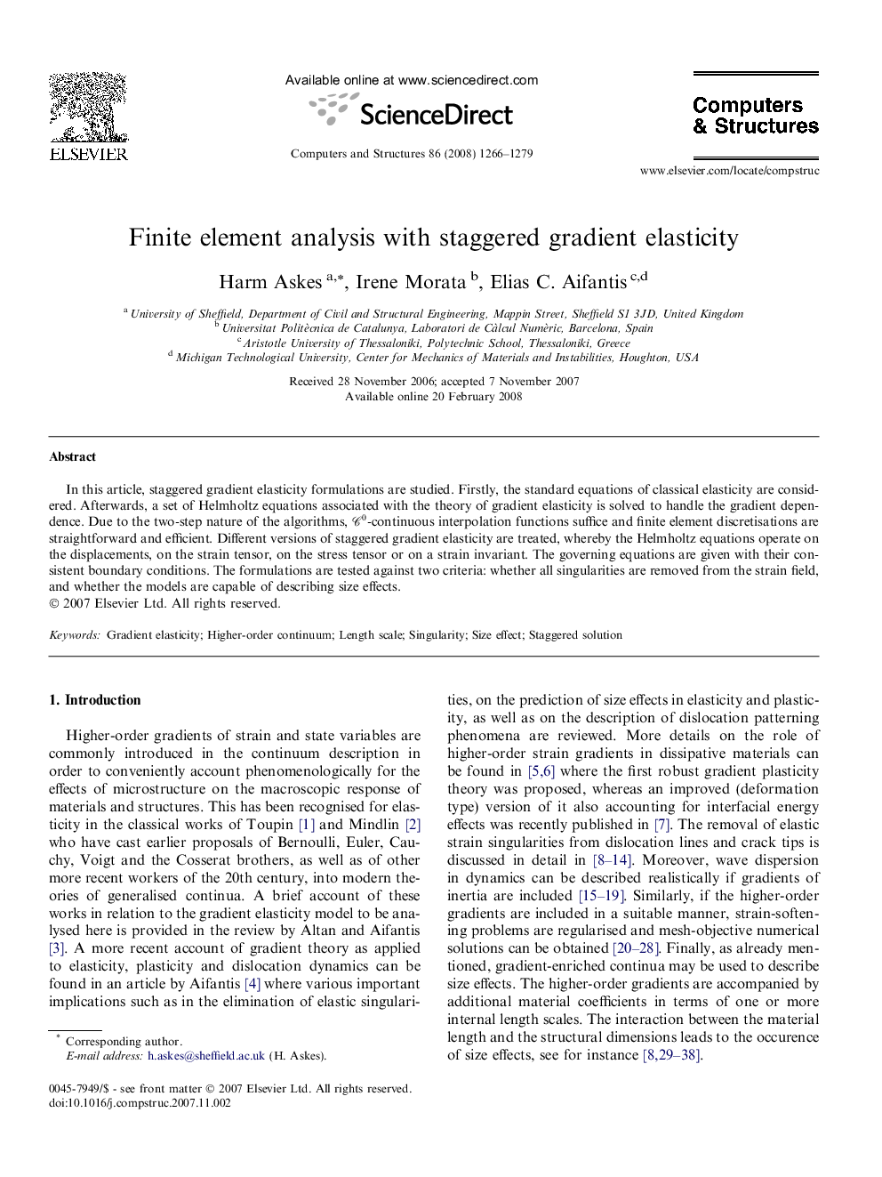 Finite element analysis with staggered gradient elasticity