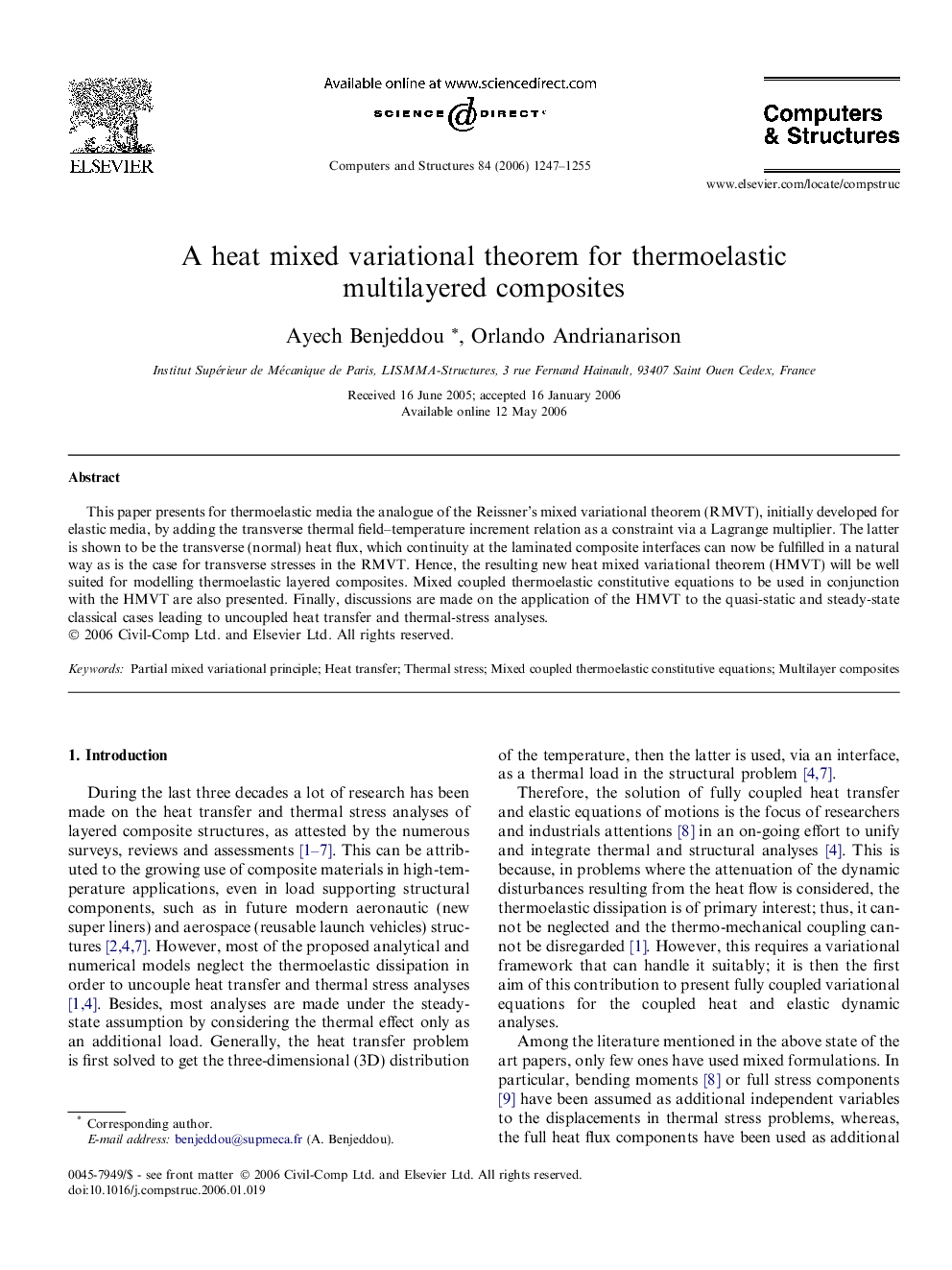 A heat mixed variational theorem for thermoelastic multilayered composites