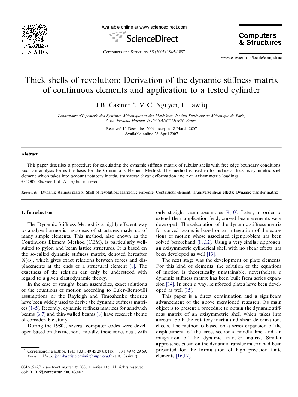 Thick shells of revolution: Derivation of the dynamic stiffness matrix of continuous elements and application to a tested cylinder