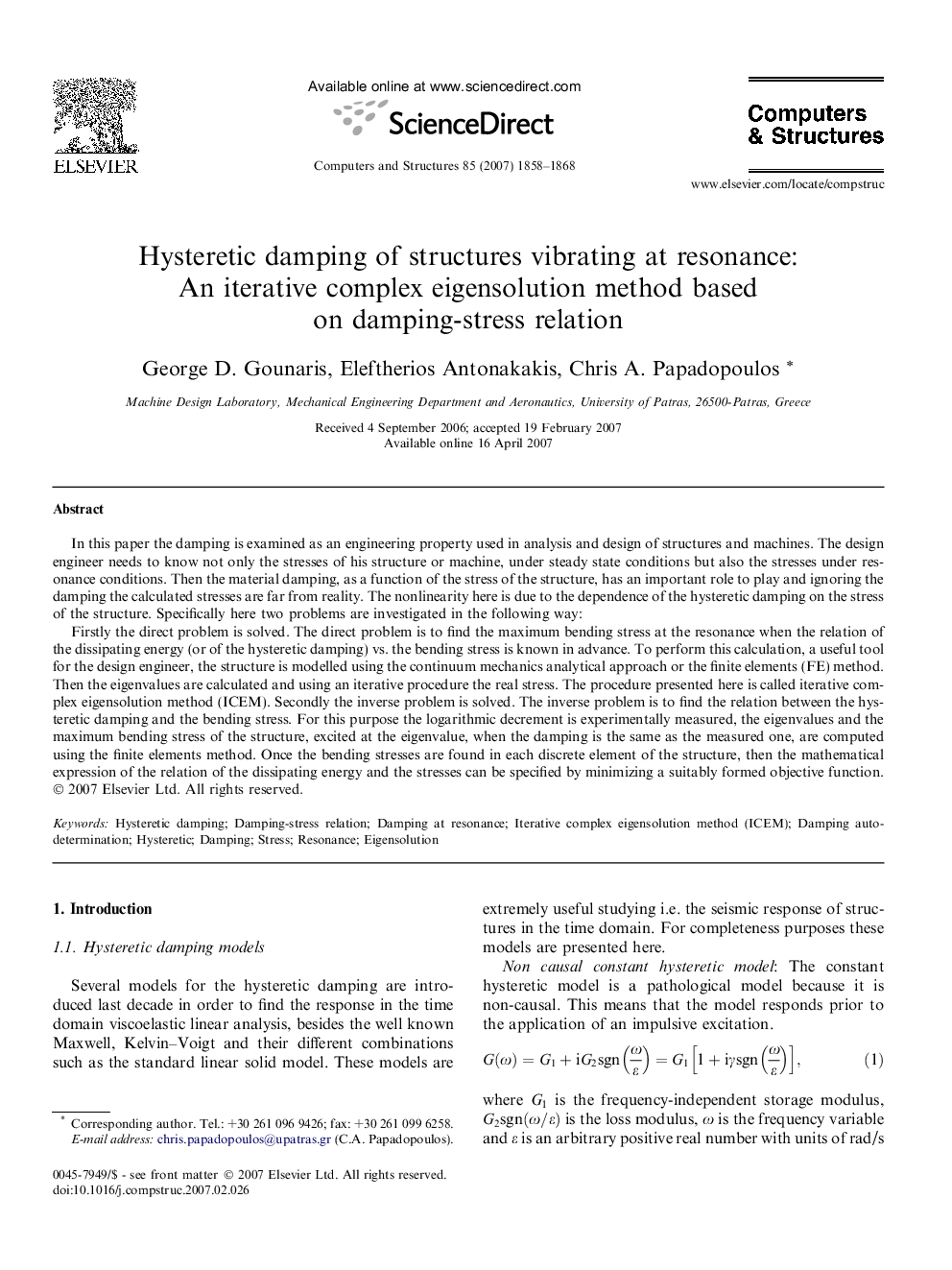 Hysteretic damping of structures vibrating at resonance: An iterative complex eigensolution method based on damping-stress relation