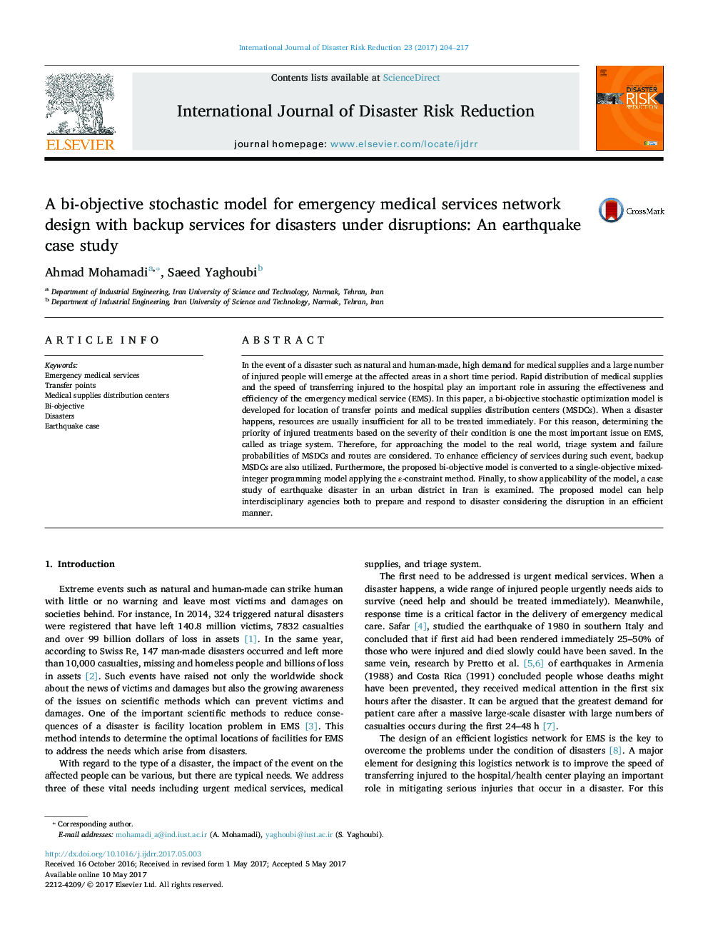 A bi-objective stochastic model for emergency medical services network design with backup services for disasters under disruptions: An earthquake case study