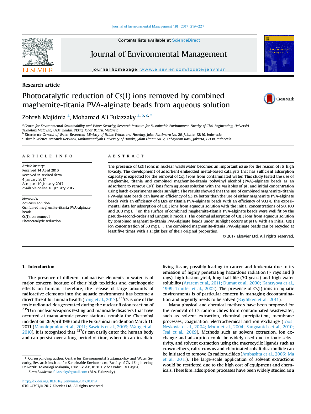 Photocatalytic reduction of Cs(I) ions removed by combined maghemite-titania PVA-alginate beads from aqueous solution