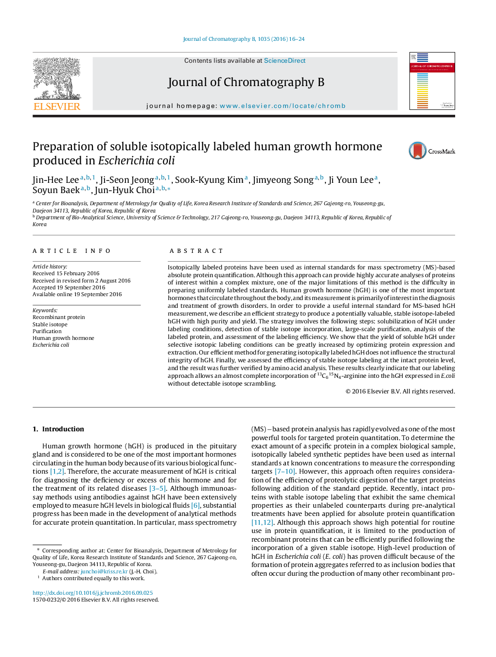 Preparation of soluble isotopically labeled human growth hormone produced in Escherichia coli