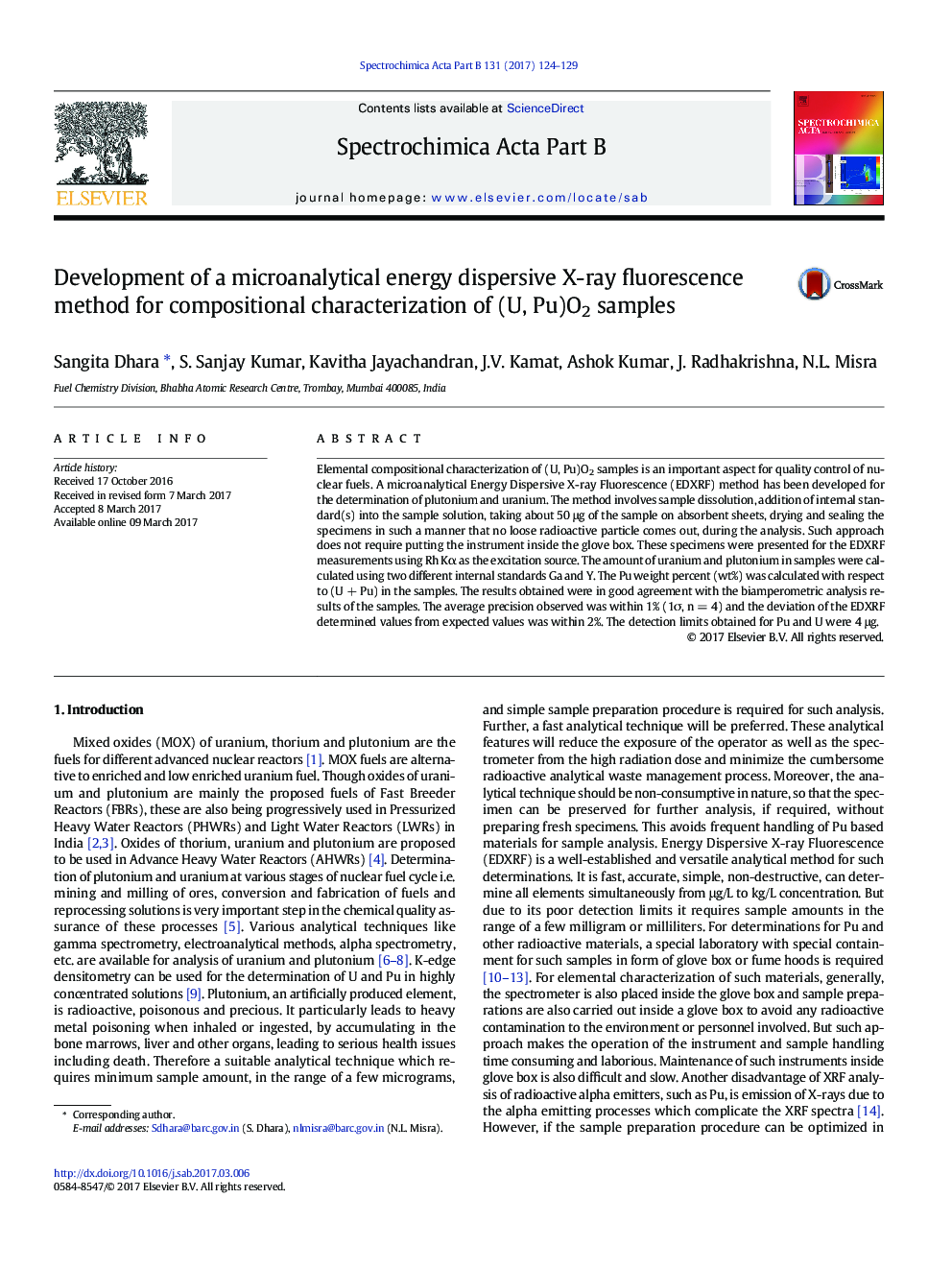 Development of a microanalytical energy dispersive X-ray fluorescence method for compositional characterization of (U, Pu)O2 samples