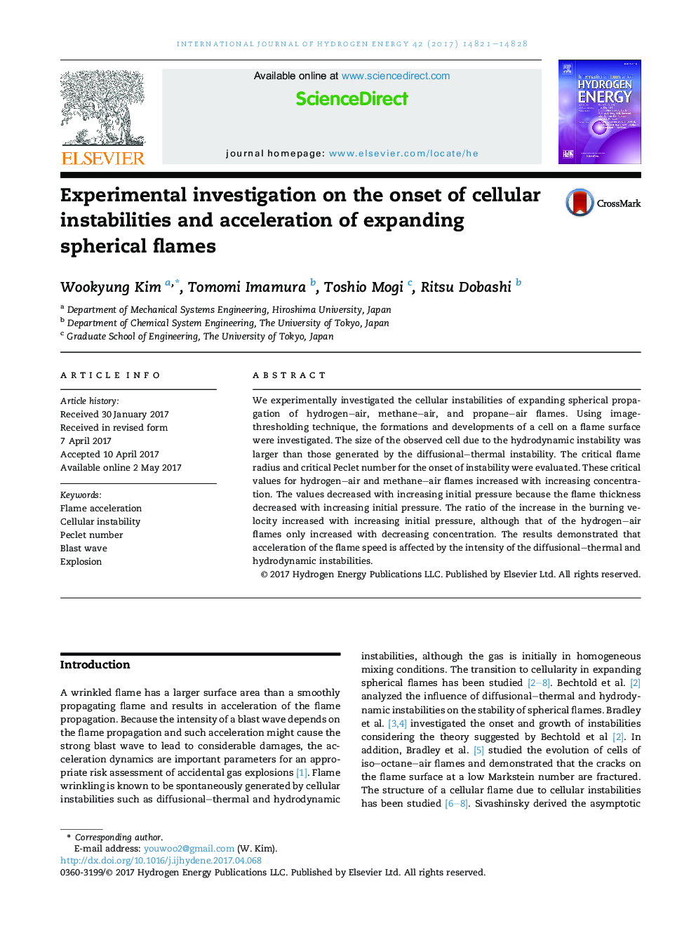 Experimental investigation on the onset of cellular instabilities and acceleration of expanding spherical flames