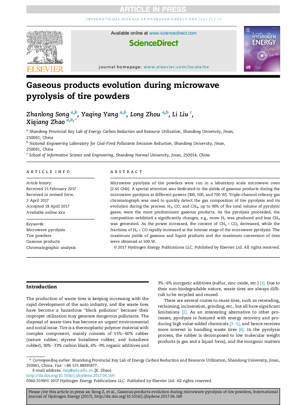 Gaseous products evolution during microwave pyrolysis of tire powders