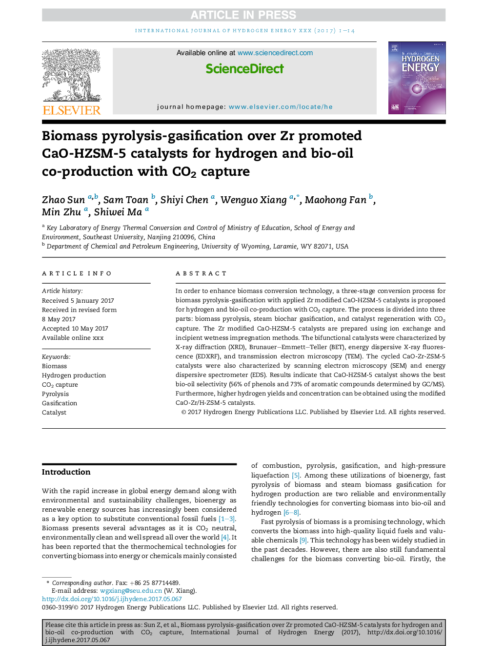 Biomass pyrolysis-gasification over Zr promoted CaO-HZSM-5 catalysts for hydrogen and bio-oil co-production with CO2 capture