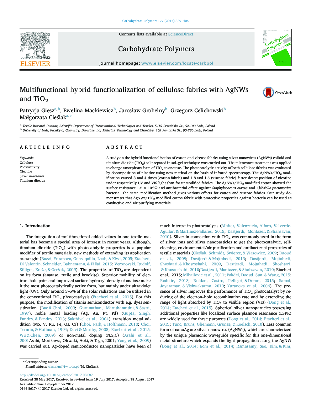 Multifunctional hybrid functionalization of cellulose fabrics with AgNWs and TiO2
