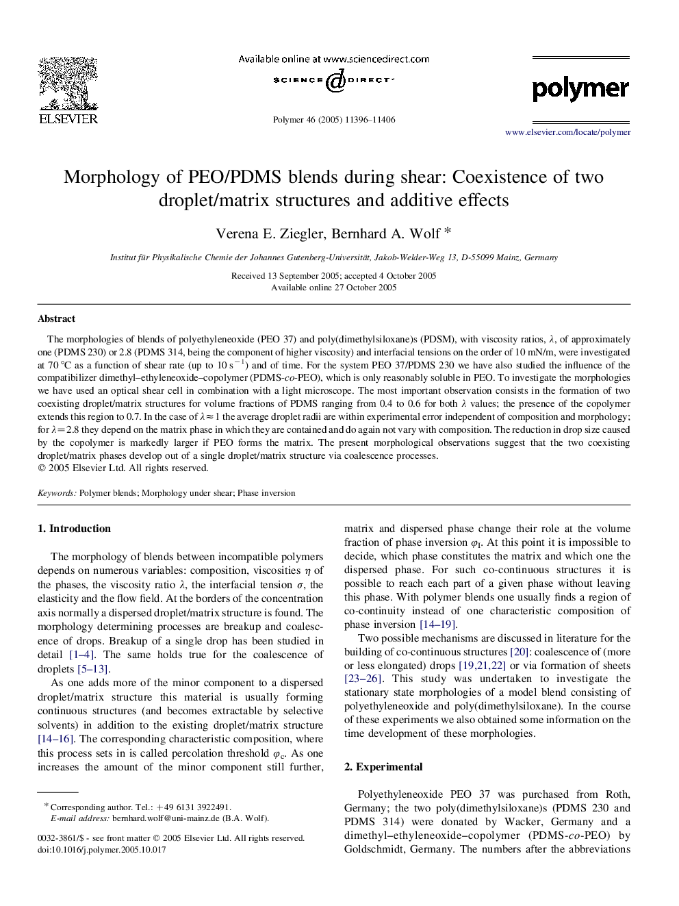 Morphology of PEO/PDMS blends during shear: Coexistence of two droplet/matrix structures and additive effects