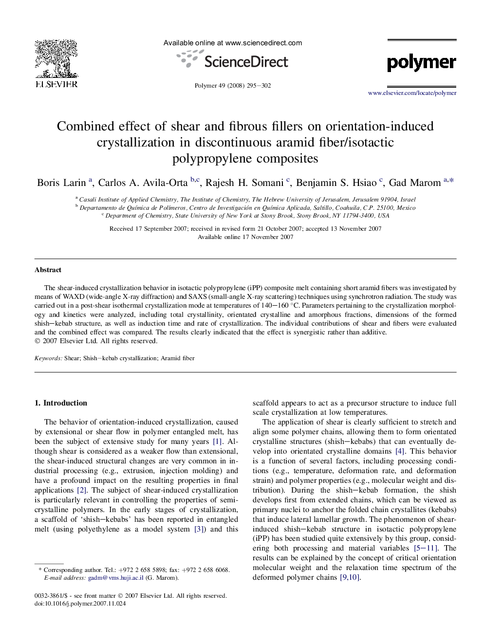 Combined effect of shear and fibrous fillers on orientation-induced crystallization in discontinuous aramid fiber/isotactic polypropylene composites