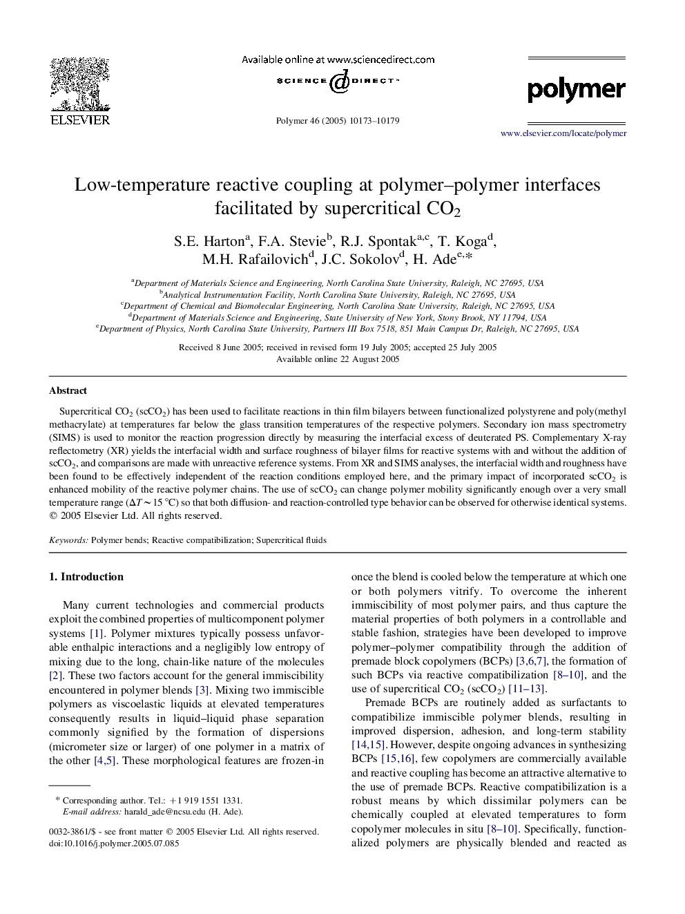 Low-temperature reactive coupling at polymer-polymer interfaces facilitated by supercritical CO2